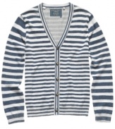 A sweater with swagger. This striped cardigan from Guess is the most modern way to layer up.