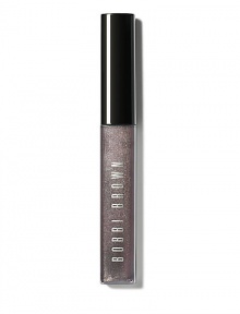 Infused with just a hint of pearly shimmer, this gives lips a subtle, glimmering look. Inspired by the play of pretty shades with an edgy twist, this gloss is part of Bobbi's Caviar & Oyster Collection and adds non-sticky shine to bare lips or your favorite lipstick. Formulated with aloe extract to soothe and soften lips; Vitamins C and E for anti-oxidant protection; and jojoba and avocado oils to moisturize lips. Made in USA. 