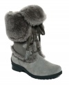 From Russia, with love. The plush faux fur cuff and waterproof suede upper of Khombu's Russia boots set the stage for a warm and cozy winter. Stay grounded with the sturdy lug sole.