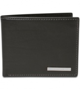 A simply elegant bifold wallet from Geoffrey Beene, featuring four credit card pockets and a flip-up case for ID.