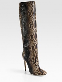 Cowboy grit meets cocktail glitz in this ultra-luxe python boot. Self-covered heel, 4¾ (120mm)Shaft, 15Leg circumference, 13¼Python upperPull-on styleLeather lining and solePadded insoleMade in Italy