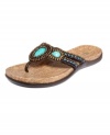 Completely irresistible. Beaded embellishments take center-stage on Kenneth Cole Reaction's All Glam thong sandals.