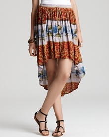 Must-have style arrives with this Free People skirt flaunting a floral print and exaggerated high/low hem. Wear it to work the on the weekend--this pull-on piece boasts staple status.