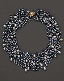 Six-row grey freshwater pearl necklace with clasp closure.