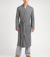 Luxurious, knit robe is incredibly smooth and soft for endless hours of comfort.Shawl collarTie waistFront patch pockets53% polyamide/47% viscoseMachine washImported