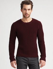 Merino wool makes this classic crewneck irresistible.CrewneckPull-on styleRibbed trimMerino woolDry cleanImported of Italian fabric