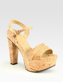 Natural cork platform sandal with a slight metallic finish and an adjustable ankle strap. Self-covered heel, 5 (125mm)Covered platform, 2 (50mm)Compares to a 3 heel (75mm)Metallic cork upperLeather liningRubber solePadded insoleImported