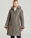 An A-line silhouette lends a feminine feel to a winter-ready coat from WOOLRICH JOHN RICH & BROS.