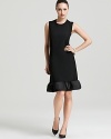 A cascade of circular pleats round the hemline of this Bloomingdale's Exclusive BASLER dress for a thoroughly modern approach to the classic LBD. Keep the silhouette center stage with sleek black accents.