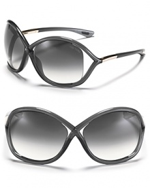 Tom Ford's sunglasses have open lens detail at temple; gradient lenses. Logo on temple tips. Case included.