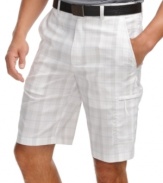 Keep your cool cruising the green in these comfortable plaid shorts from Greg Norman for Tasso Elba.