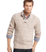 Cabling and toggle details add dapper attitude to this key Izod layering piece.