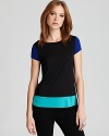 The color-block trend goes laid-back chic in this BCBGMAXAZRIA tee, punctuated by punchy hues at the sleeves and hem.