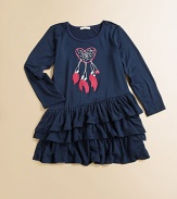 This adorable dress sports asymmetrical ruffles and an embroidered heart-shaped dreamcatcher motif.ScoopneckLong sleevesPull-on styleThree-tiered asymmetrical ruffle hem95% rayon/5% spandexMachine washImported