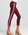 Contrast stripes down the legs add a pop of color to these Hudson skinny jeans.