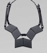 Pieced together diamond-shape brass plaques and strips of rich Italian leather come together in this street-smart, edgy design.Black, powder-coated brassLeatherHematite finish chainLength, about 19Lobster claspMade in USA