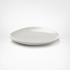 Borrowing from nature, this Pebblestone salad plate is metaphorically contoured and highly glossed in straightforward colors. The silhouette, a DVF signature, makes tables shine. Create interesting contrasts or pair with perfect matches.