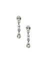 An eye-catching effect. The dangle silhouette adds a dramatic design detail to these gorgeous drop earrings from Givenchy. Crafted in silver tone mixed metal, they're embellished with dazzling crystal accents. Approximate drop: 1 inch.