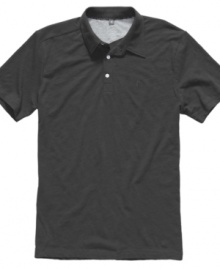 Prep up your t-shirt collection with this solid polo style by Volcom.