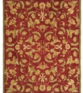 Bold burgundy houses an intricate assortment of intertwined blossoms and vines on this Turkish-inspired area rug from Safavieh. Pure wool is hand-tufted in a thick three-quarter-inch pile, finished with a cotton backing for long-lasting durability.