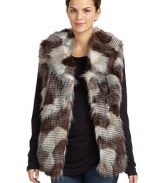 THE LOOKVariegated faux fur design Shawl collarFront fur hook closuresSleevelessSeam pocketsTHE FITAbout 26 from shoulder to hemTHE MATERIALPolyester/acrylicCARE & ORIGINDry cleanImportedModel shown is 5'10 (177cm) wearing US size Small. 