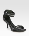 Casual leather silhouette with zipper details and a wrap-around ankle strap. Stacked heel, 3Leather upperLeather lining and solePadded insoleImportedOUR FIT MODEL RECOMMENDS ordering true size. 