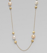 From the Africa Pearl Collection. A delicate link chain with 18k gold and cultured freshwater pearl stations for a look that's both feminine and unique. 18k goldRound white and champagne cultured freshwater pearlsLobster clasp closureLength, about 36Made in Italy