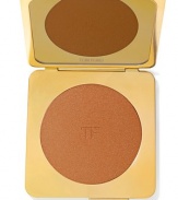 Enhance the impact of the Tom Ford signature look by creating a sensuous, bronzed face with this silky, lightweight powder. With an exclusively formulated mineral blend of sunstone, amber and black tourmaline crystals combined with unique pigments, it flawlessly highlights the skin's natural radiance or accents an existing tan.  Brush lightly on cheekbones to define and amplify the bone structure, or dust all over the face to create the ultimate warm and seductive glow.