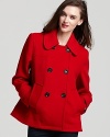 Hunter's classic peacoat gets a lift in a fiery hue--perfect for playful daytime style.