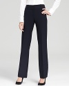 Sleek tailoring gives the timeless BOSS Black suiting pants a super-feminine feel. Lengthen the straight silhouette with pointy-toe pumps and rise to new heights of office chic.