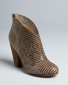 Get exotic in these reptile-embossed Modern Vintage booties that capture the Western trend with retro sophistication.