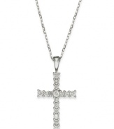 Slim and resplendent, this beautiful cross pendant features round-cut diamonds (1/4 ct. t.w.) set in 14k white gold. Approximate length: 16 inches. Approximate drop: 1 inch.