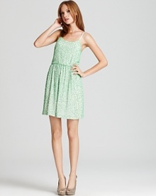 A get-noticed dress that's perfect for the next big event, Alice + Olivia's sleeveless dress is embellished with matte green sequins and an exposed silver back zip for an extra sliver of shine.