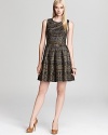 Multicolor metallics shimmer and shine on this Shoshanna dress, crafted in a woven jacquard.