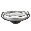 Crafted from stunning metal alloy, this lovely bowl is destined to become a go-to piece. Its pod-shaped vessel artfully frames whatever you put in it with its gently curling lip and a dose of glossy shine, and then tapers to a graceful pedestal base.