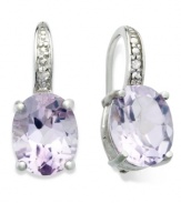 The perfect pop of purple. Victoria Townsend's stunning sterling silver earrings feature X-cut amethyst (4-3/4 ct. t.w.) and glittering diamond accents. Approximate drop: 3/4 inch. Approximate diameter: 3/8 inch.