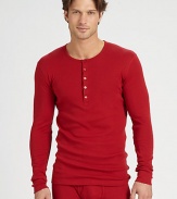 Perfect for cold-weather layering, this long-sleeved henley tee offers incredible warmth and comfort, crafted from soft, smooth cotton.CrewneckFive-button placketCottonMachine washImported