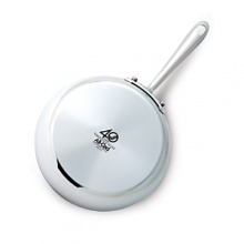 Handcrafted of American-made steel in Pennsylvania-as it has been for four decades-this special edition fry pan features a commemorative 40th anniversary logo on its bottom. Well suited for fast cooking with oils over high heats, this kitchen workhorse is ideal for everything from scrambling eggs and bacon to preparing a quick chicken sauté dinner.