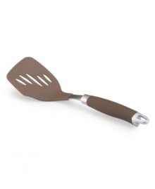 Totally turn things around in the kitchen! Food prep gets a precision edge with a sleek slotted bronze-hued turner that combines a silicone SureGrip handle and durable stainless steel for comfort and strength that bring even more meals to the table.