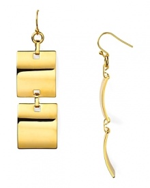 Gleaming geometric drop earrings from Trina Turk channel subtle seventies glamour. Rock them with loose hair and dramatic eyes like modern-day disco diva.