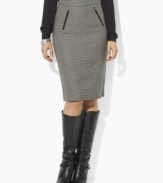 Look sophisticated and elegant at the office wearing Lauren by Ralph Lauren's chic wool houndstooth pencil skirt, accented with faux-leather trim and equestrian details.