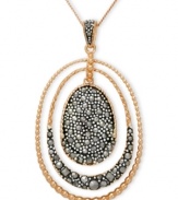 Add some glitter and glam to your look. Genevieve & Grace's pretty graduated oval drop pendant features sparkling marcasite in 18k rose gold over sterling silver. Approximate length: 18 inches. Approximate drop: 1-11/16 inches.