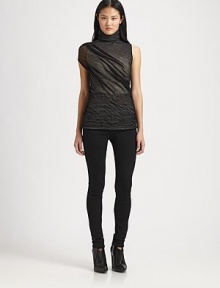 Draped sheer layer gives this soft sleeveless knit a mysterious edge. TurtleneckSingle sheer cap sleeveSheer knit overlay50% cotton/44% wool/5% nylon/1% LycraDry cleanMade in ItalyModel shown is 5'10 (177cm) wearing US size X-Small/Small.