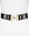 Cole Haan defines the waist with croc-embossed leather and a bold interlocking buckle.