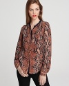 A sleek python print in a fall-perfect palate adorns this luxe silk Rebecca Taylor henley.