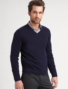 More than the ordinary pullover sweater, this v-neck knit is made from a stylish combination of cotton and cashmere.V-neckLong sleevesPullover70% cotton/30% cashmereDry cleanImported