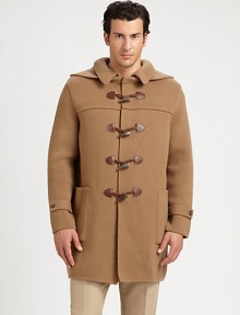 Impeccably crafted in Italy from luxurious wool, this cold weather essential exudes a modern sensibility with a point collar and attached hood, finished with leather-accented toggle closure for a heritage-inspired feel.Toggle closureAttached hoodWaist patch pocketsAbout 35 from shoulder to hemWoolDry cleanMade in Italy