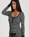 Sweet dreams in stripes: Juicy Couture's scoop-neck henley features on-trend stripes and a cute heart charm detail.