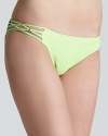 PilyQ turns up the brights with the Brie bikini, a standout in lime green with braided and beaded details.