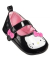 Happy feet. She'll be dainty and sweet in a pair of these darling Hello Kitty mary jane shoes from ABG Accessories.